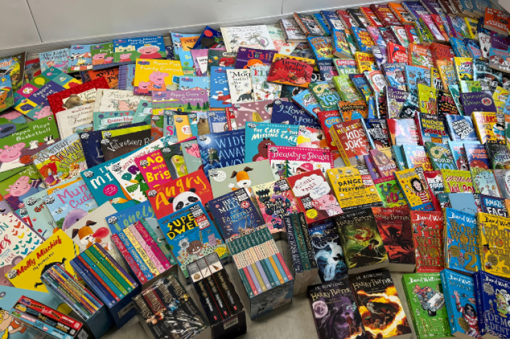 Taziker donate over 800 children’s books to charity